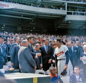 President John F. Kennedy shakes hands with Washington Senators Manager, Mickey Vernon, during opening day of the 1963 season at D.C. Stadium.